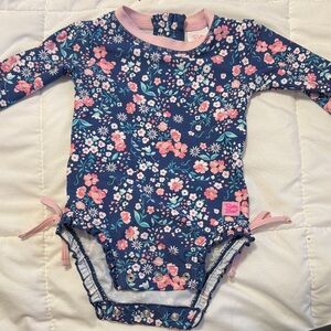 Ruffle Butts Navy and Pink Floral Bodysuit